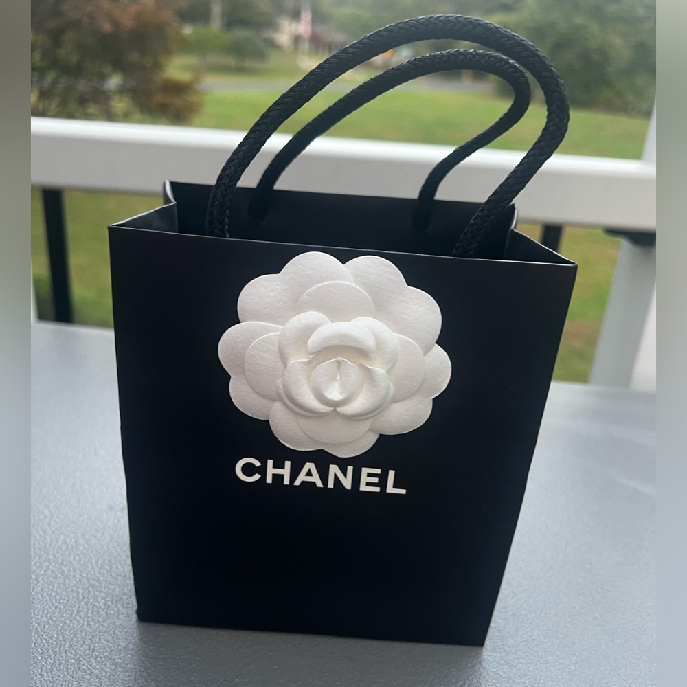 CHANEL Black Recyclable Paper Bag With White Flower